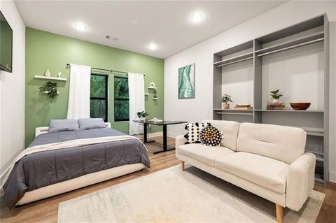 Studio Apartment Building with Rooftop Deck
