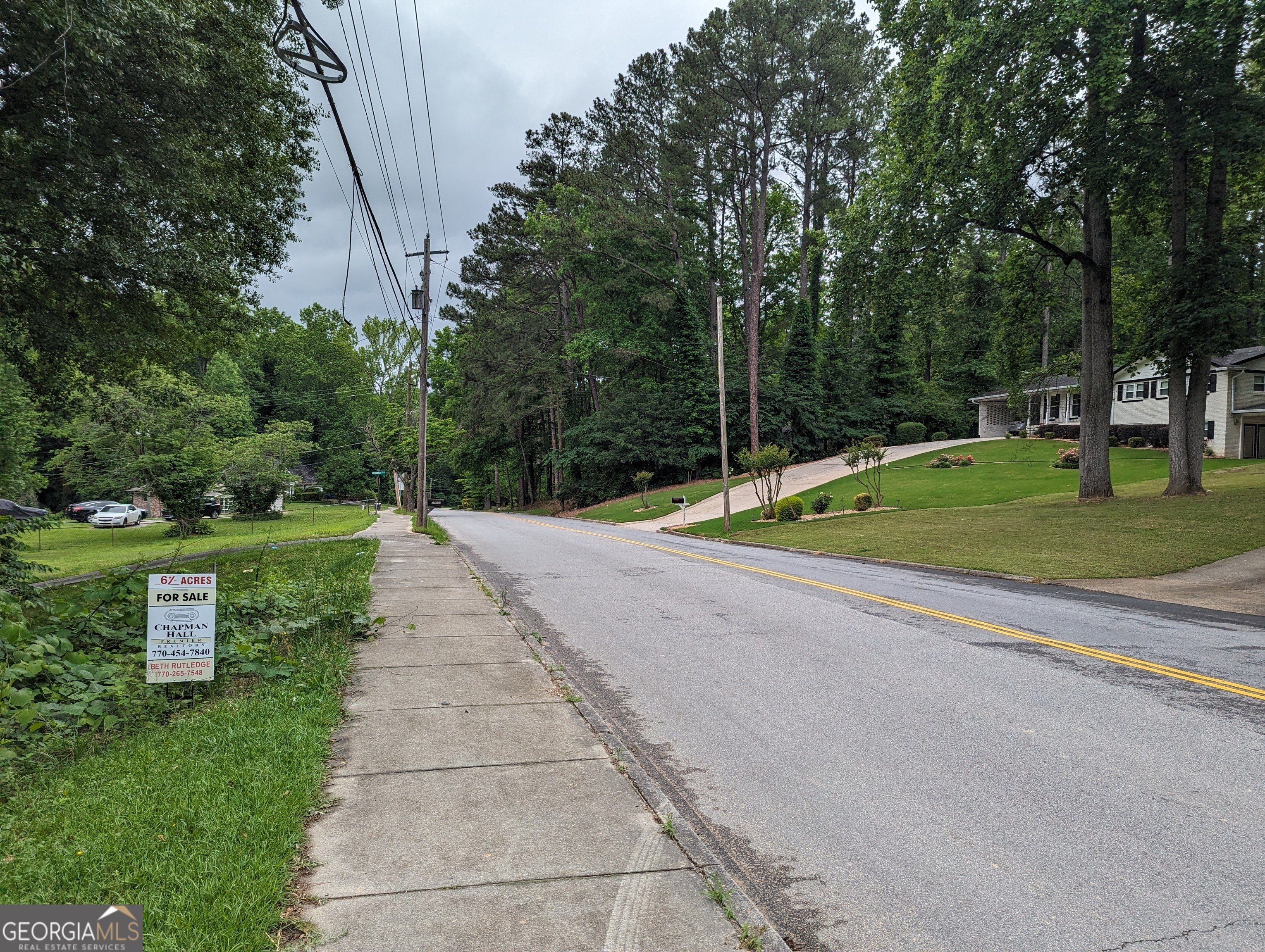 Wooded Acreage in Established Neighborhood