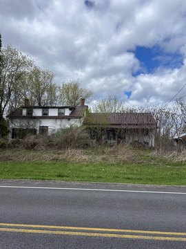 Land with Abandoned House