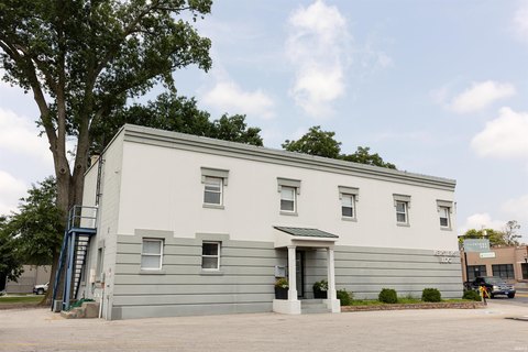 Second-Floor Office Suite with Garage Bay