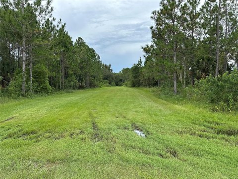 Waterfront Corner Lot in Gated Golf Community