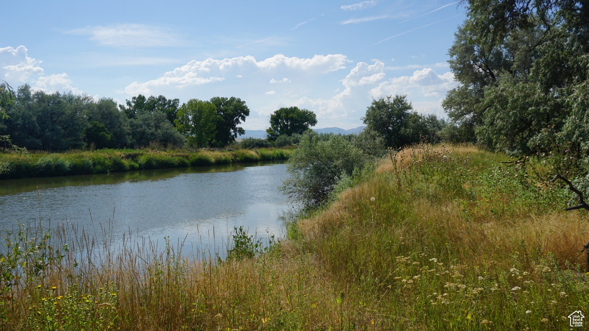 Riverfront Land with Mountain Views