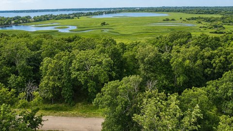 Waterfront Wooded Lot in Gated Community
