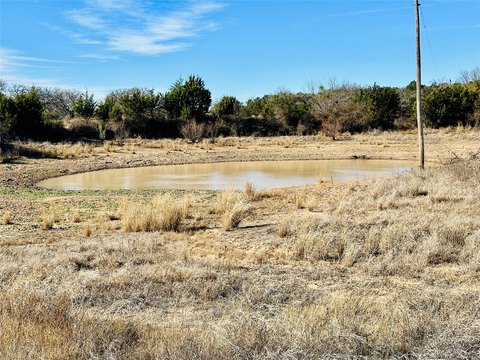 Acreage with Wells and Stock Tank