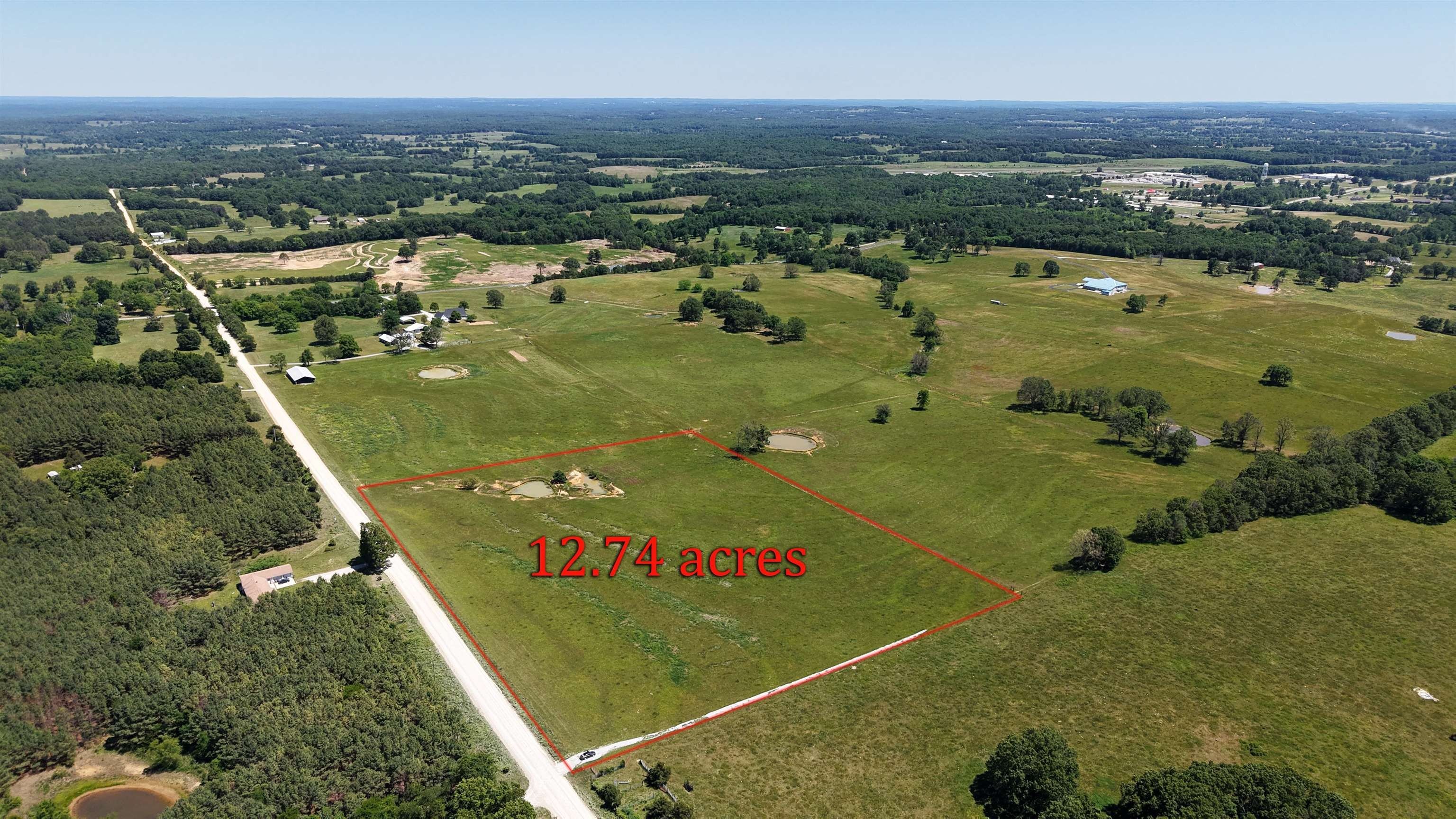 Melbourne Acreage with Pond