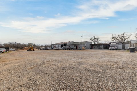Industrial Yard with Workshop and Home