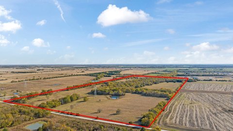 Ranch Land with Pond and Timber