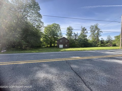 Land with Lake and Mountain Views