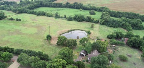 Farm and Home Acreage with Pond