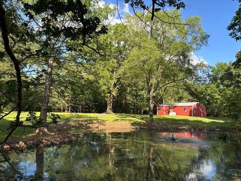 Unrestricted Acreage with Private Pond