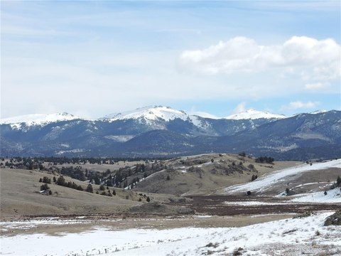 Land with Snowcap Views
