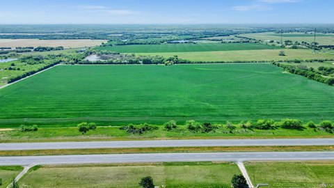 Commercial Land with Triple Road Frontage