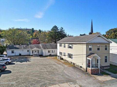 Two Commercial Buildings with Parking