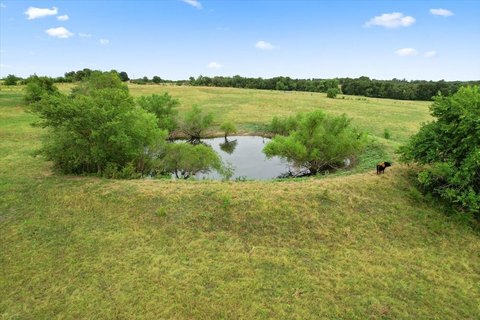 Unimproved Agricultural Land with Pond
