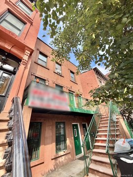 Triplex Apartment Building with Gated Driveway
