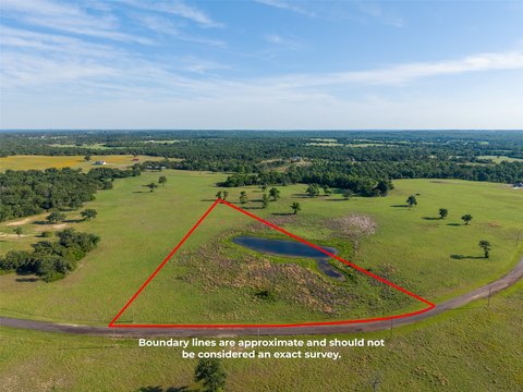Gated Acreage Tract with Private Pond