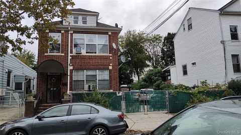 Brick Duplex with Detached Garage