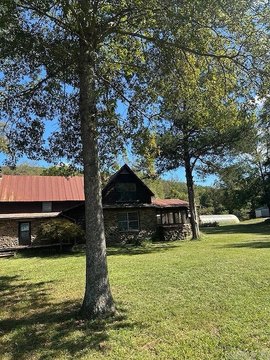 Mulberry Riverfront Land with Historic Cabins