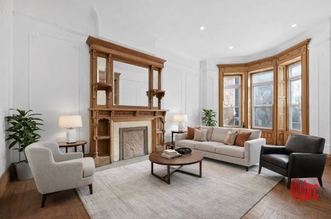 Partially Restored Two-Family Townhouse