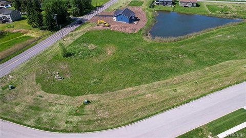 Residential Land Overlooking Serene Pond