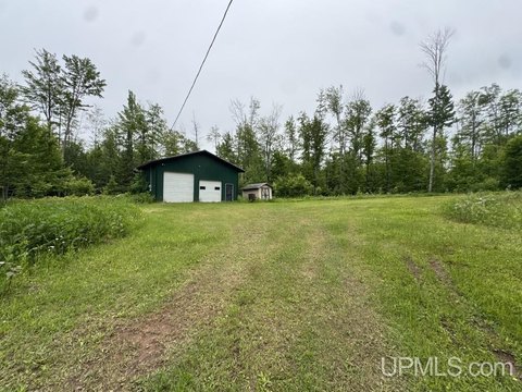 Land with Insulated Steel Garage