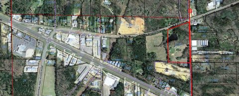 Commercial Land with Existing Improvements