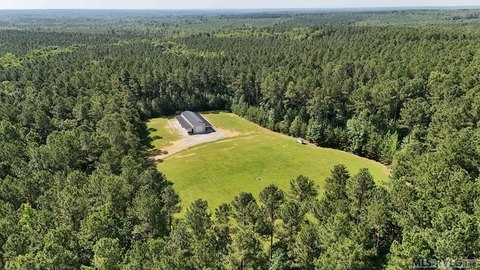 Unrestricted Land with Metal Building