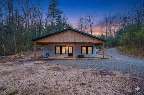 Land with Partially Finished Home