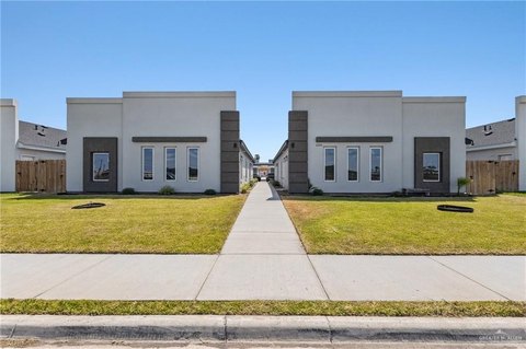 Fourplex with Private Fenced Backyards