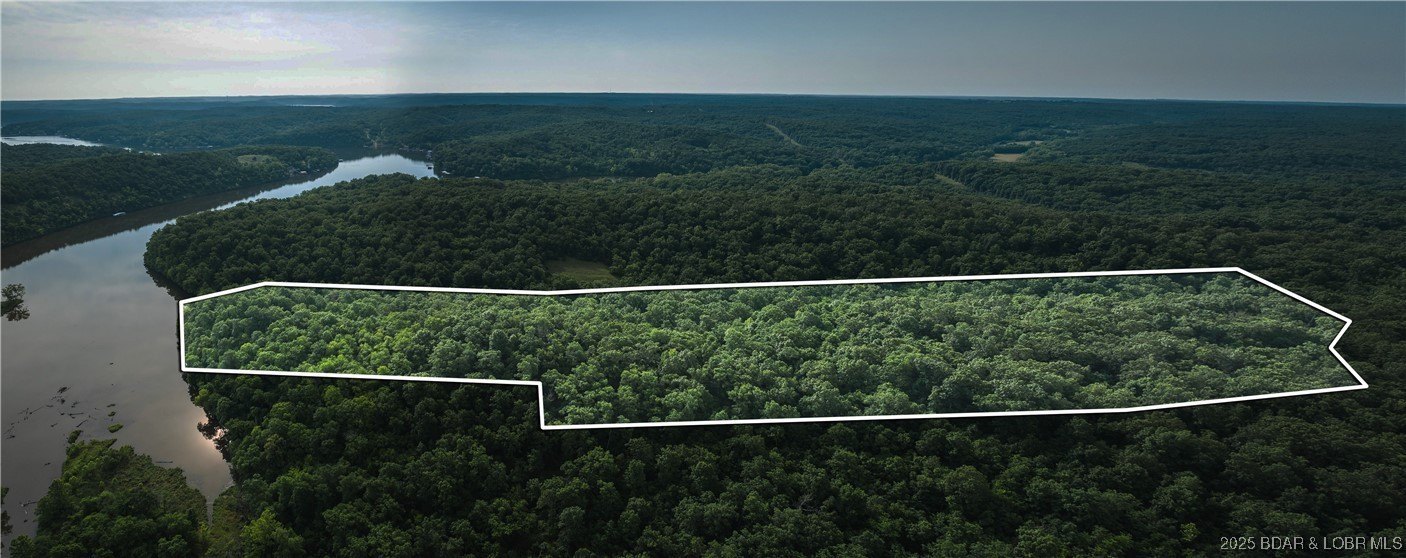 Lakefront Wooded Acreage Opportunity