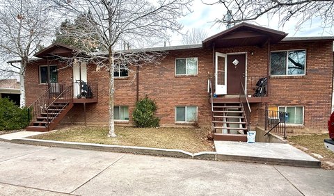 Updated Triplex with Garage/Shop