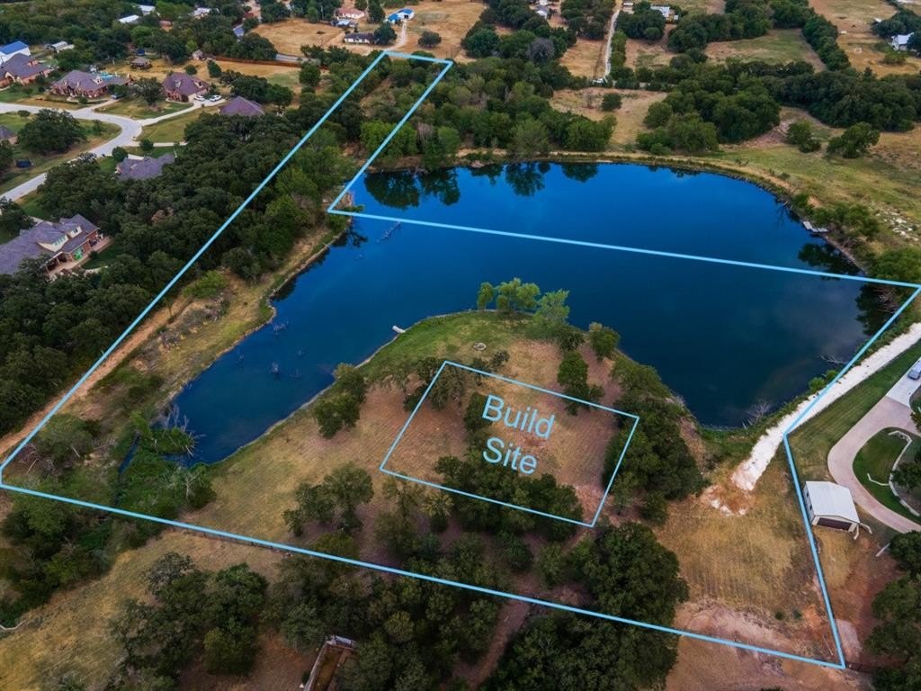 Treed Acreage with Pond