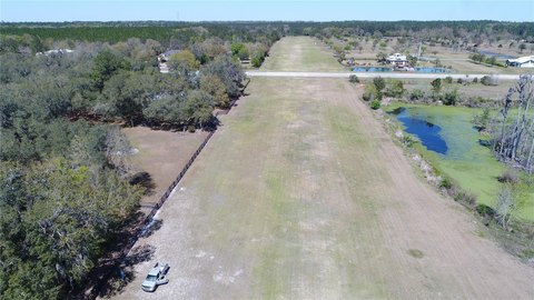 Partially Wooded Airpark Lot