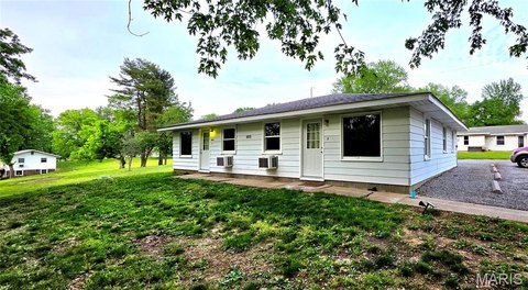 Well-Maintained Duplex with Extra Lots