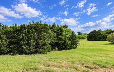 Improved Homesite in Gated Golf Community