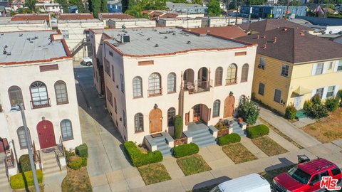 Mid-City Fourplex with Value-Add Potential