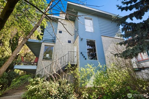 Occupied Triplex with Four Parking Stalls