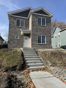 All-Brick Duplex with Attached Garages