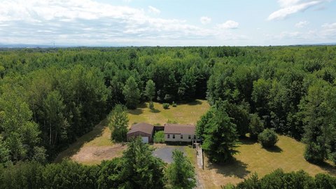 Residential Waterfront Acreage with Pond