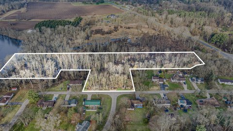 Wooded Land with River Frontage