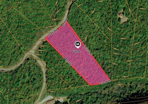 Land with Boat Near Lake