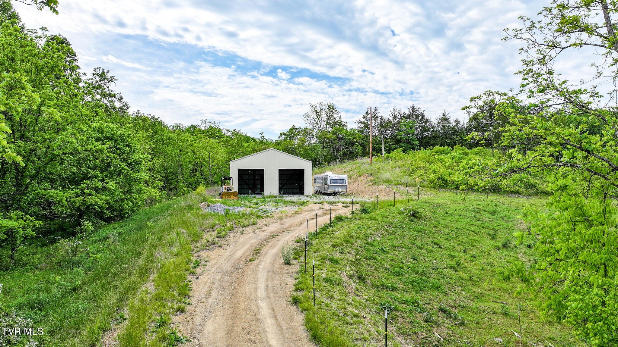 Unrestricted Land with Building, Creek