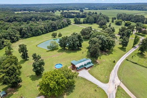 Custom Log Home with Pond