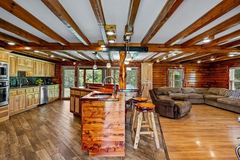 Custom Log Home with Pond