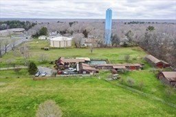 Versatile Raynham Property with Income Potential