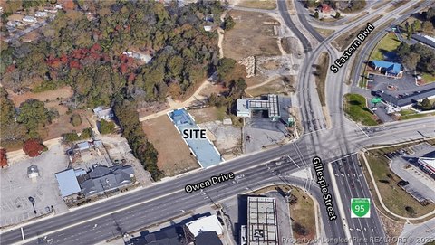 Cleared Commercial Lot with Concrete Pad