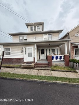 Corner-Lot Duplex With Separate Utilities