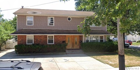 Legal Two-Family Corner Home
