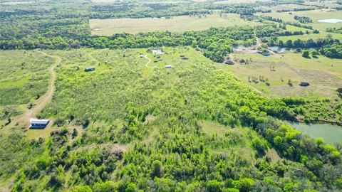 Acreage with Storage Barn and Ponds