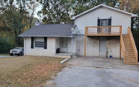 Madisonville Triplex with Development Potential
